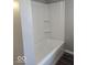 Bathroom showcasing a white shower and tub at 2968 N Arsenal Ave, Indianapolis, IN 46218