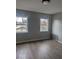 A cozy bedroom with two windows at 2968 N Arsenal Ave, Indianapolis, IN 46218