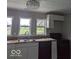 Kitchen with a large window and a double sink at 2968 N Arsenal Ave, Indianapolis, IN 46218
