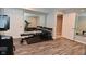 Basement gym area with weights, workout bench, and mirrored wall at 3251 Amber Way, Bargersville, IN 46106