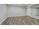 Finished basement with neutral walls, and a mirrored wall perfect for a dance or workout studio at 3251 Amber Way, Bargersville, IN 46106
