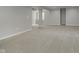 Unfinished basement with neutral carpet, columns, and windows for natural light at 3251 Amber Way, Bargersville, IN 46106