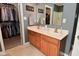 Bathroom showcasing a double vanity, closet, and coordinated decor at 3251 Amber Way, Bargersville, IN 46106