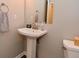Half bathroom featuring a pedestal sink and neutral wall color at 3251 Amber Way, Bargersville, IN 46106