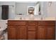 Bathroom with double vanity sinks, neutral color palette, and modern fixtures at 3251 Amber Way, Bargersville, IN 46106