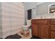 Bathroom featuring a shower with a stylish curtain, toilet and wooden cabinet at 3251 Amber Way, Bargersville, IN 46106