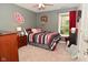 Stylish bedroom with sports-themed decorations, soft carpet, and comfortable bed at 3251 Amber Way, Bargersville, IN 46106