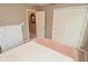 Comfortable bedroom featuring a bed with soft pink accents and ample natural light at 3251 Amber Way, Bargersville, IN 46106