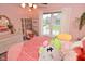 Charming bedroom decorated with whimsical décor, natural light, and playful accessories at 3251 Amber Way, Bargersville, IN 46106