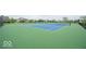Community tennis courts with green and blue surfacing, surrounded by neighborhood homes at 3251 Amber Way, Bargersville, IN 46106