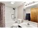 Clean bathroom featuring a shower with showerhead, a toilet, a vanity, and a mirror at 3310 Ransdell St, Indianapolis, IN 46227