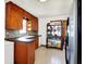 Functional kitchen featuring ample cabinet space, a practical layout, and a view of a window at 3310 Ransdell St, Indianapolis, IN 46227