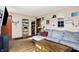 Comfortable living room showcasing hardwood floors, neutral walls, and an inviting sectional sofa at 3310 Ransdell St, Indianapolis, IN 46227