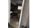 A view into a functional laundry room with washer, dryer, and a toilet at 3417 N Sadlier Dr, Indianapolis, IN 46226