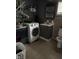 Functional laundry room with washer, dryer, and ample storage space at 3417 N Sadlier Dr, Indianapolis, IN 46226