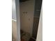 A small shower with a tiled wall, and two shower heads at 3417 N Sadlier Dr, Indianapolis, IN 46226