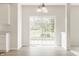 Dining area with sliding glass door leading to a deck or patio at 3419 Burlingame Blvd, Carmel, IN 46074