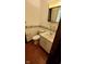 Bathroom with toilet, sink and mirror at 3702 Candy Cane Dr, Indianapolis, IN 46227