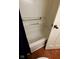 Standard white bathtub with white walls and wood-look flooring is available at 3702 Candy Cane Dr, Indianapolis, IN 46227
