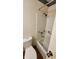 Bathroom with a standard shower-tub, toilet, and safety grab bars at 3702 Candy Cane Dr, Indianapolis, IN 46227