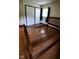 Empty bedroom featuring wood floors and two closets at 3702 Candy Cane Dr, Indianapolis, IN 46227