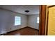 Bedroom with two windows and hardwood floors at 3702 Candy Cane Dr, Indianapolis, IN 46227