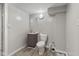 Cozy bathroom with a toilet, vanity, and a clean, classic design for personal care and convenience at 376 S Arlington Ave, Indianapolis, IN 46219