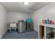 Functional laundry room with a utility sink and newer appliances; ideal for everyday convenience at 376 S Arlington Ave, Indianapolis, IN 46219