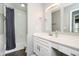 The clean bathroom has a double sink vanity, a large mirror, and a shower/tub with curtain at 3852 Knollton Rd # 3852, Indianapolis, IN 46228