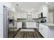 Updated kitchen with white cabinets, stainless steel appliances, and modern finishes at 3852 Knollton Rd # 3852, Indianapolis, IN 46228