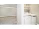 A laundry area is conveniently located near bedrooms for easy washing and drying at 3852 Knollton Rd # 3852, Indianapolis, IN 46228
