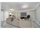 Inviting living room with neutral colors, comfortable seating, modern lighting, and decorative accents at 3852 Knollton Rd # 3852, Indianapolis, IN 46228