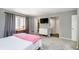 Bright bedroom featuring a large window, closet and ensuite bathroom at 3852 Knollton Rd # 3852, Indianapolis, IN 46228