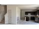 Spacious kitchen features dark cabinets and an open layout, great for Gathering and entertaining at 3897 Berkdale Ct, Columbus, IN 47203