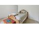 Serene bedroom with light walls, showcasing cozy bedding and bright decor accents at 410 Sugar Tree Ln, Indianapolis, IN 46260