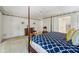 Generous bedroom with connecting bathroom and two entry doors showcases bright neutral decor at 410 Sugar Tree Ln, Indianapolis, IN 46260