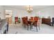 Dining room featuring a round table with seating for six and classic chandelier at 410 Sugar Tree Ln, Indianapolis, IN 46260