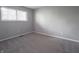 This bedroom features gray walls, carpet, and a window with blinds at 4268 Foxglove Trce, Indianapolis, IN 46237