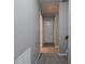 View of the upstairs hallway with carpet flooring and fresh paint at 4268 Foxglove Trce, Indianapolis, IN 46237