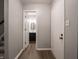 Hallway view with the bathroom visible through the doorway at 4268 Foxglove Trce, Indianapolis, IN 46237