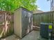 Exterior shot of storage shed and HVAC unit, nestled on the side of the property at 4268 Foxglove Trce, Indianapolis, IN 46237