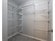 Walk-in closet is equipped with adjustable shelving for storage and organization at 4268 Foxglove Trce, Indianapolis, IN 46237