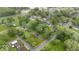 An aerial view showcasing the property's location within a quiet, tree-lined neighborhood at 450 Pleasant St, Noblesville, IN 46060