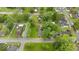 Bird's eye view reveals the home's position on a well-manicured lot in a residential area at 450 Pleasant St, Noblesville, IN 46060