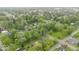Drone shot of the home situated on a lush, green lot in a peaceful residential community at 450 Pleasant St, Noblesville, IN 46060