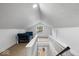 Finished attic featuring a couch and bright natural light at 450 Pleasant St, Noblesville, IN 46060
