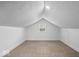 Finished attic featuring neutral carpet and a window at 450 Pleasant St, Noblesville, IN 46060