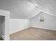 Finished attic featuring neutral carpet and a window at 450 Pleasant St, Noblesville, IN 46060