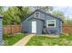 Backyard featuring a patio, firepit, and grassy lawn at 450 Pleasant St, Noblesville, IN 46060