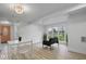 Bright living room featuring wood floors, modern furniture, and natural light at 450 Pleasant St, Noblesville, IN 46060